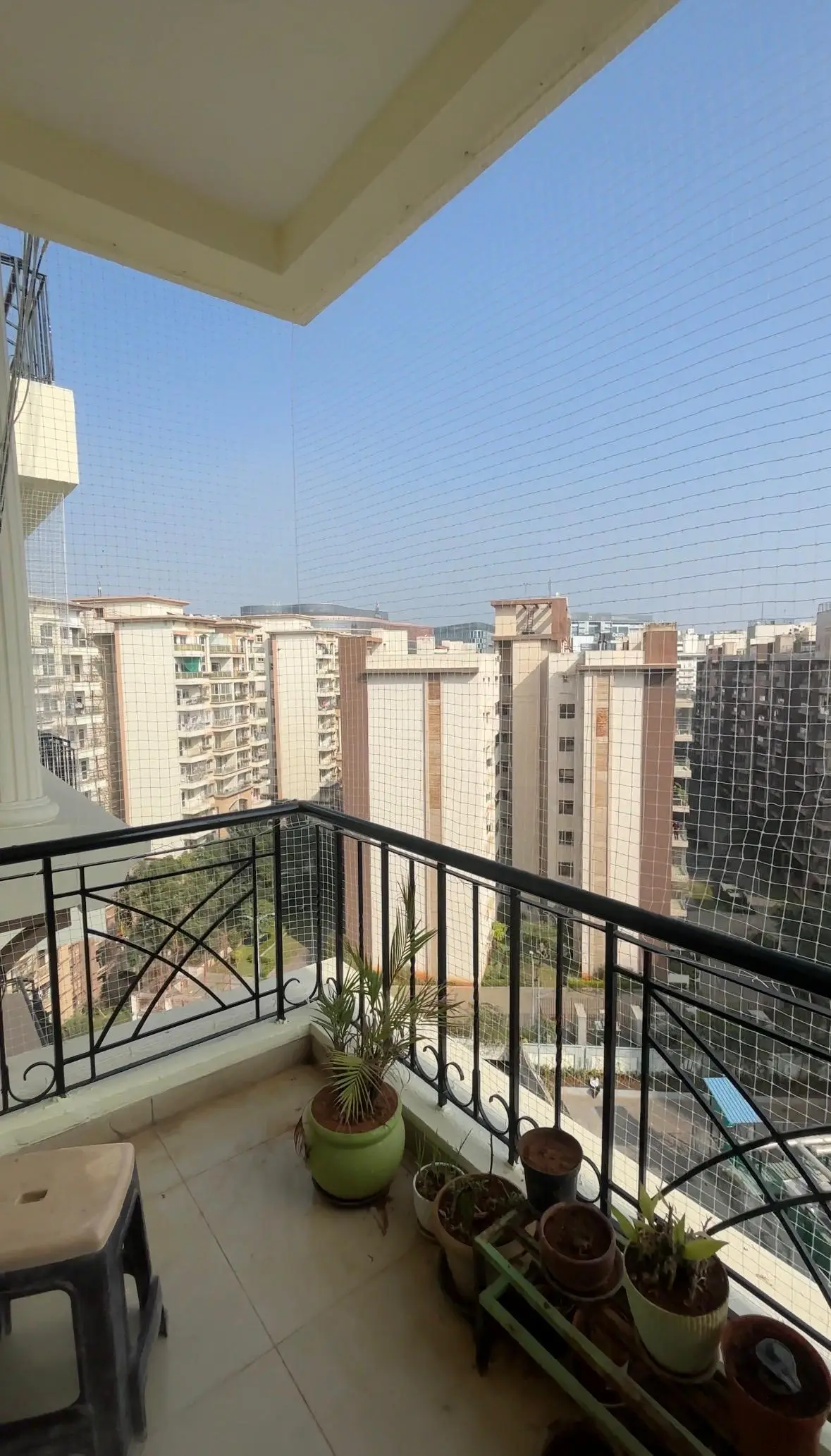 High-tensile balcony safety net installation on residential Bangalore apartment