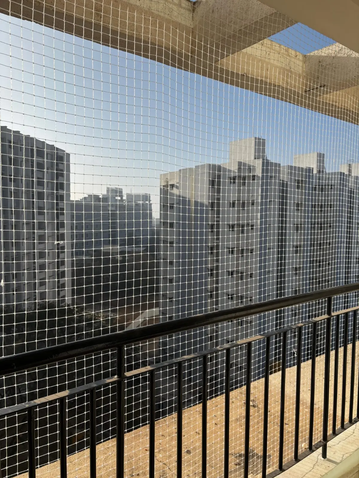 High-rise apartment balcony netting fitment in Whitefield by Shrishti Enterprises