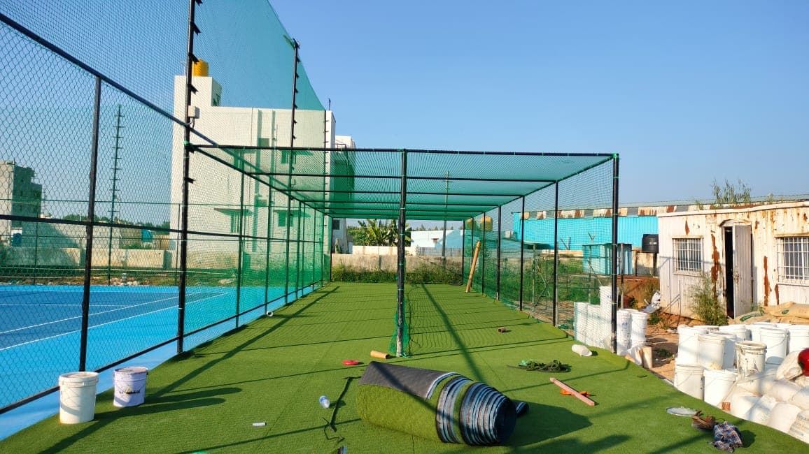 Cricket practice net enclosure installation on Bangalore terrace