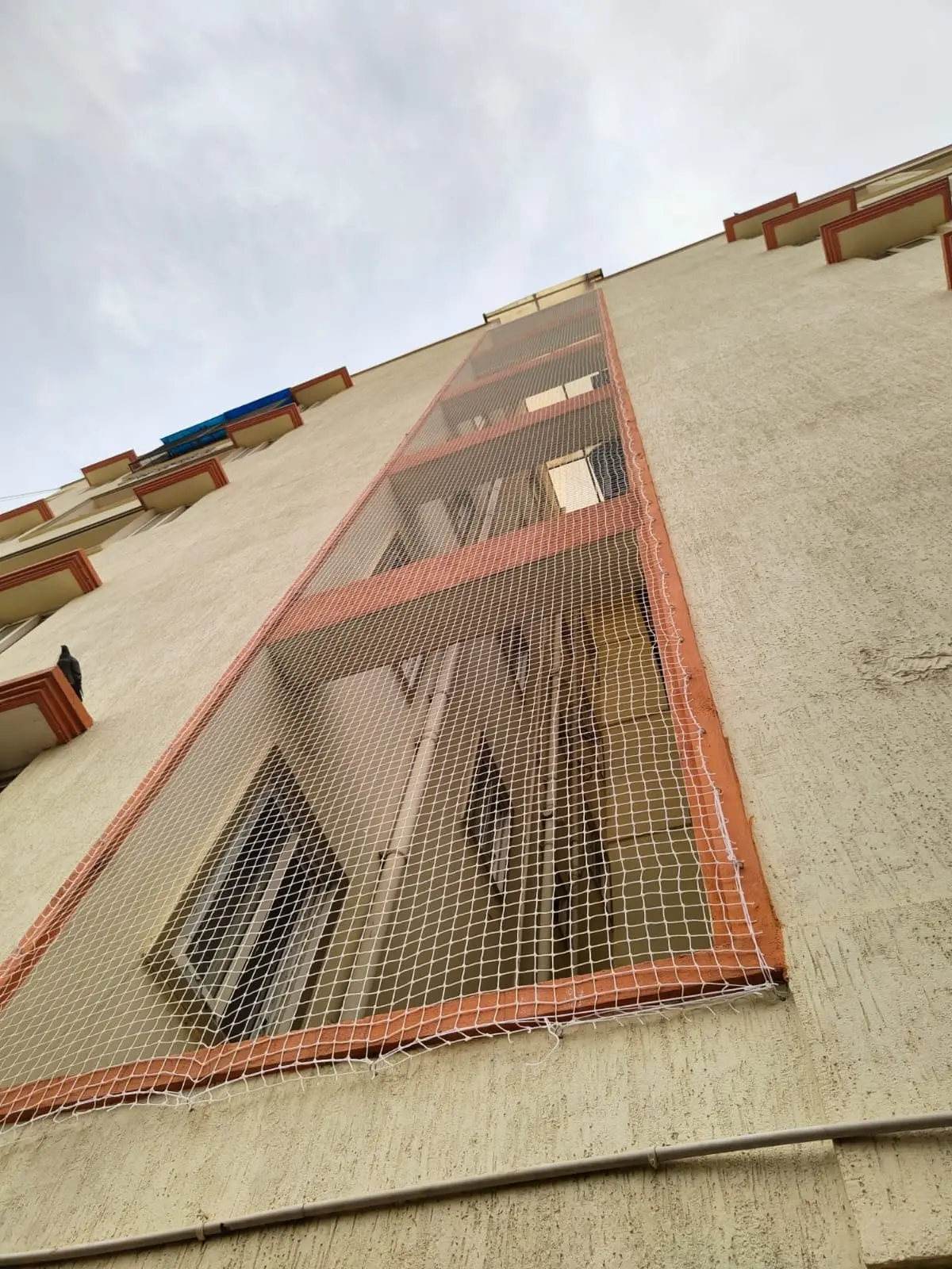 Bird netting and duct protection in Bellandur high-rise